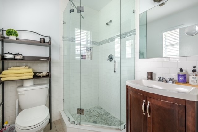 Bathroom with storage shelves in Delray Beach vacation rental